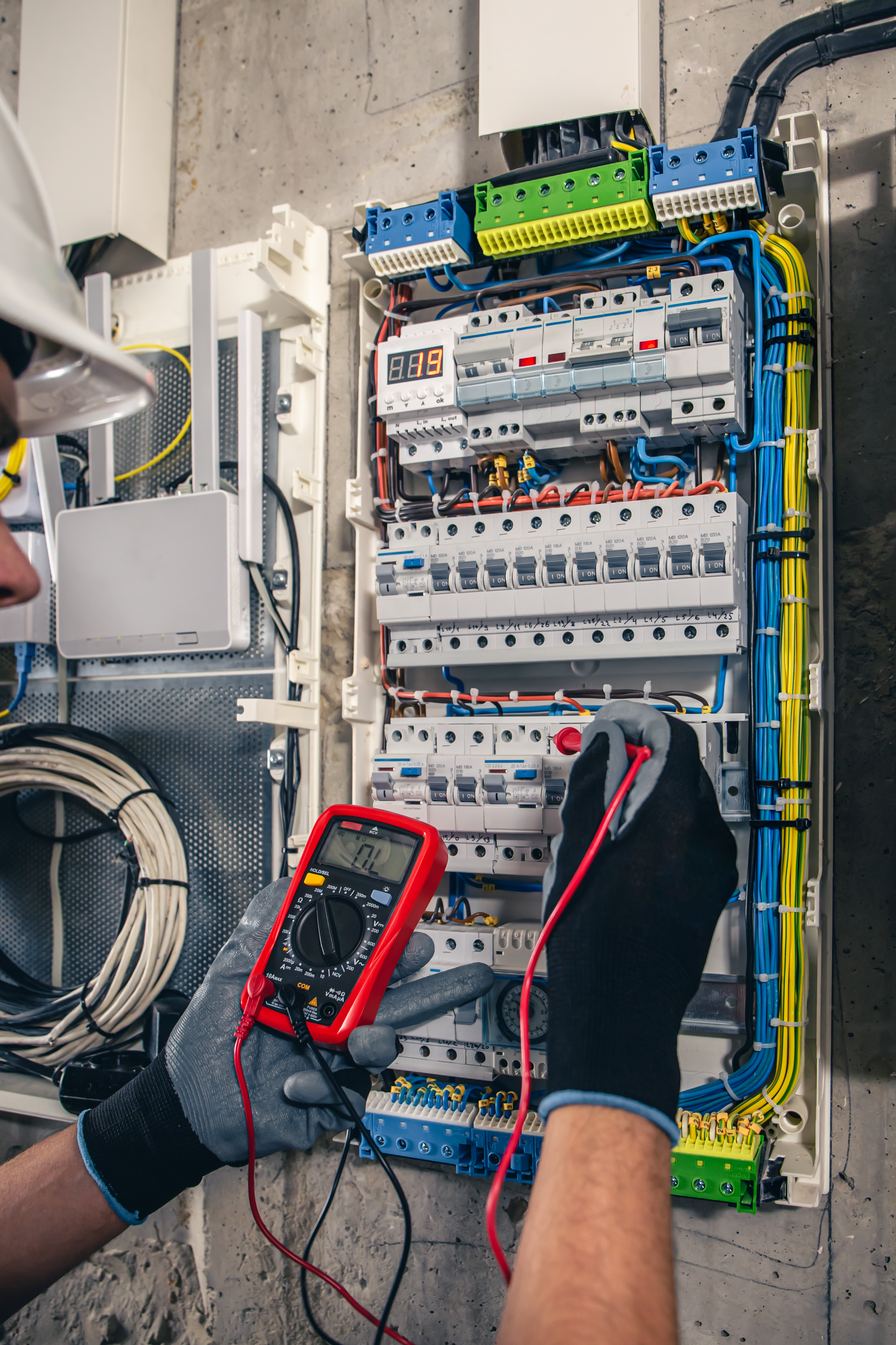 Electrical Technician working on switchboard